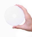 Hand holding white blank cd dvd disc Royalty Free Stock Photo