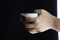 Hand Holding white cup with no food