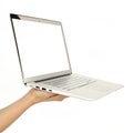 Hand holding white laptop screen mockup isolated on white background Royalty Free Stock Photo