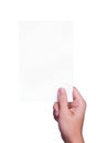 Hand holding white paper sheet Royalty Free Stock Photo
