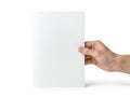 A hand holding a white rectangular object in front of a plain white background Royalty Free Stock Photo