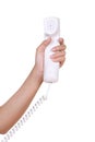 Hand holding white telephone tube Royalty Free Stock Photo