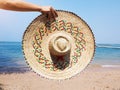 Wide brim hat vintage style, fashion travel summer on the beach with woven straw hat