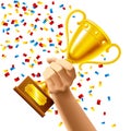 Hand holding a winner trophy cup award Royalty Free Stock Photo