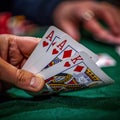 Hand Holding Winning Poker Cards Royalty Free Stock Photo