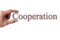 Hand holding the word cooperation Royalty Free Stock Photo