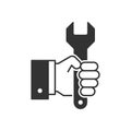 Hand holding wrench black icon