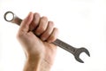 Hand holding wrench isolated. Royalty Free Stock Photo