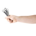 Hand holding a wrench tools, composition isolated over the white background Royalty Free Stock Photo