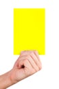 Hand Holding Yellow Card Royalty Free Stock Photo