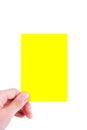 Hand Holding Yellow Card Royalty Free Stock Photo