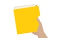 Hand holding a yellow document folder