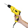 Hand holding a yellow electric drill. Close up. Isolated on white background