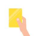 Hand holding yellow football card