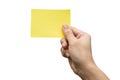 Hand holding yellow paper isolated on white with clipping path Royalty Free Stock Photo