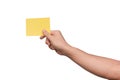 Hand holding yellow paper isolated on white with clipping path Royalty Free Stock Photo