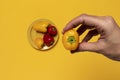 Hand holding yellow pepper fruit Royalty Free Stock Photo