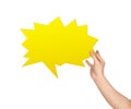Hand holding a yellow speech bubble