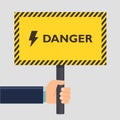 Hand holding yellow stop danger sign. Flat style design. Vector illustration.