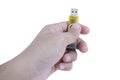 Hand holding yellow usb flash drive Royalty Free Stock Photo