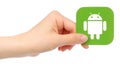 Hand holds Android icon