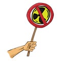 Hand holds a banner prohibiting nuclear weapons and nuclear testing. Sign prohibition of nuclear missiles and nuclear testing