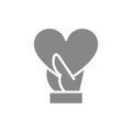Hand holds big heart gray icon. Share a love, like, feedback symbol