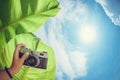 Hand holds camera. Royalty Free Stock Photo