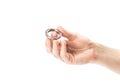 The hand holds the closed bearing. Close up. Isolated on a white background Royalty Free Stock Photo