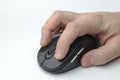 Hand holds a computer mouse. Royalty Free Stock Photo