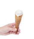 Hand holds cone vanille ice cream. Royalty Free Stock Photo