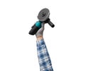 hand holds a construction tool accumulator Angle grinder Royalty Free Stock Photo