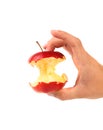 Hand holds core of an apple. Royalty Free Stock Photo