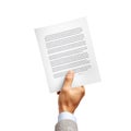 A hand holding a white paper sheet with text against a plain white background in a studio shot Royalty Free Stock Photo