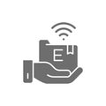 Hand holds e-learning folder, online education grey icon. Royalty Free Stock Photo