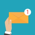 Hand holds envelope. Email and incoming messages concept. Royalty Free Stock Photo