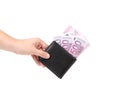 Hand holds euro bills in purse. Royalty Free Stock Photo