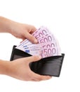 Hand holds five hundred euro from purse. Royalty Free Stock Photo