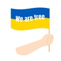 The hand holds the flag of blue-yellow Ukraine, which says We are free. The concept of freedom and patriotism. Illustration Royalty Free Stock Photo