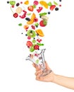 The hand holds the glass bowl of fruit salad Royalty Free Stock Photo