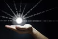 Hand holds a glowing ball emitting data Royalty Free Stock Photo