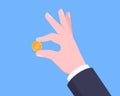 Hand holds golden coin in two fingers flat style design vector illustration. Royalty Free Stock Photo