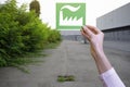 Hand holds green idustry symbol Royalty Free Stock Photo