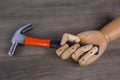 Hand holds a hammer Royalty Free Stock Photo