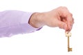 Hand holds house door key