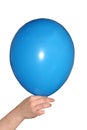 The hand holds an inflatable ball. Isolate on white background. Balloon blue