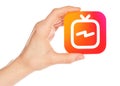 Hand holds Instagram TV icon Royalty Free Stock Photo