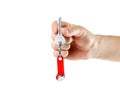 Hand holds the keys to the apartment with a chip. Close up. Isolated on white background