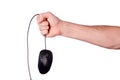 Hand holds mouse over wire on white background