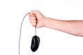 Hand holds mouse over wire on white background